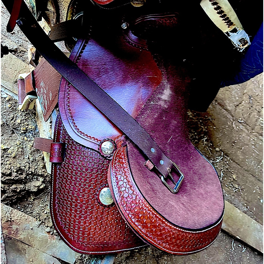2 new west saddles never been on horse or used . both are 15.5in leather.